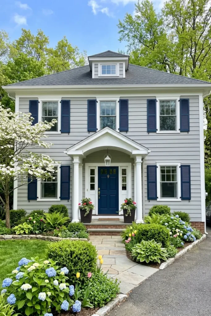 Pale Pewter Gray with Navy Shutters and White Portico